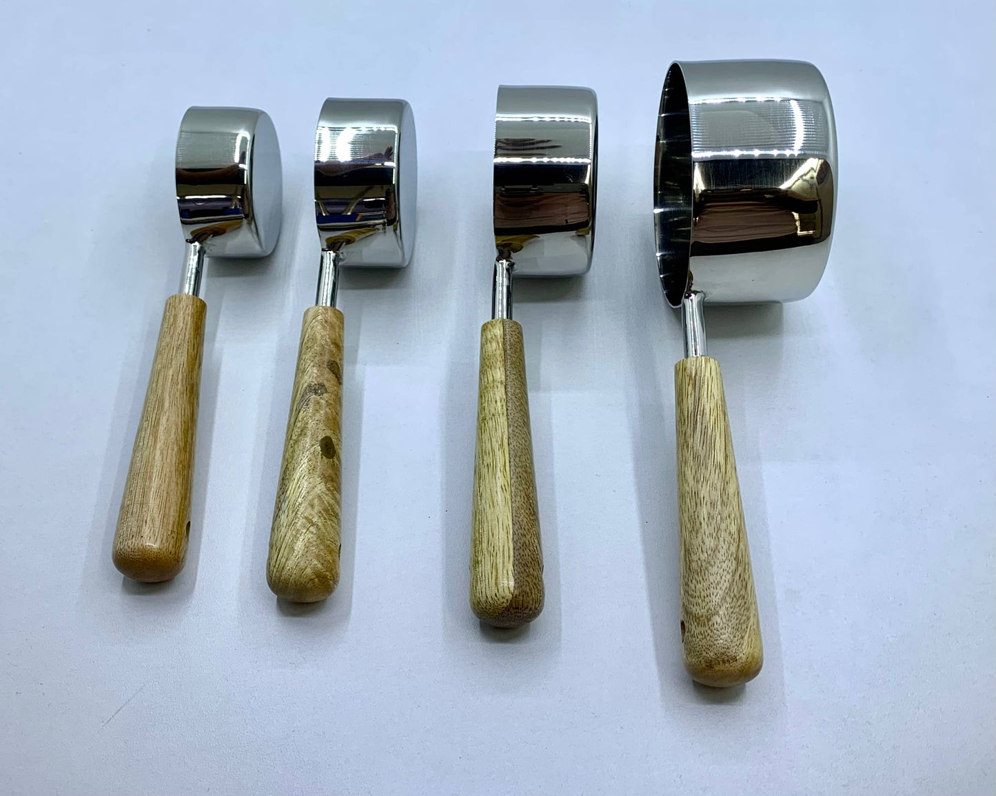 Set Of Four Measuring Cups - Steel with Wooden Handle